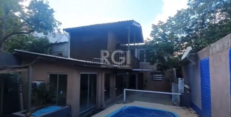 Casa com 300m², 4 dormitórios, 2 suítes, 4 vagas no bairro São João em Porto Alegre para Comprar
